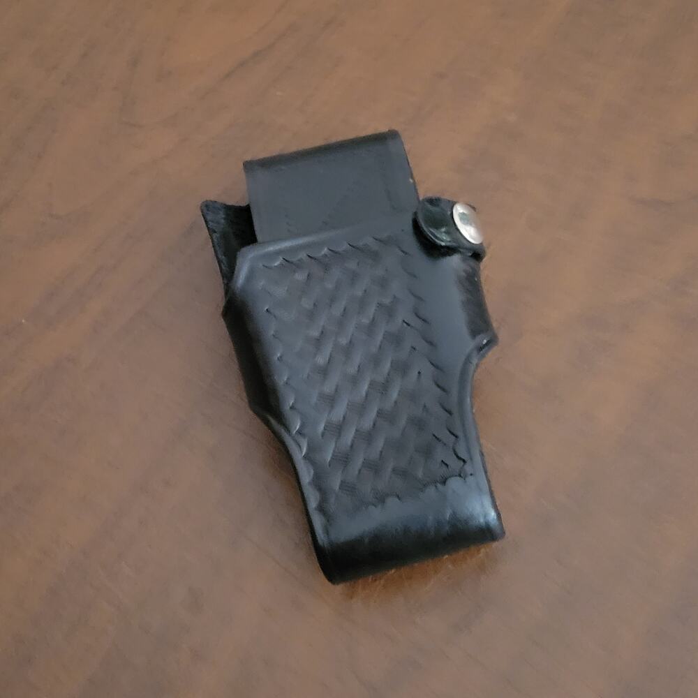 Triple K 890 Black Leather Radio Holster. Pre-owned, good shape.
